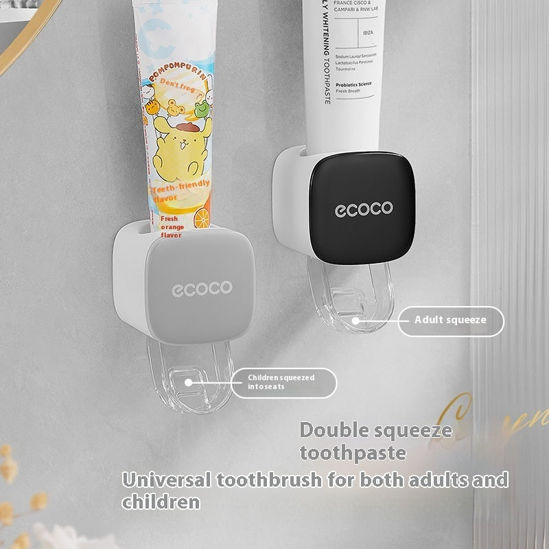 Eccoco toothbrush and toothpaste holder with toothpaste on a gray background