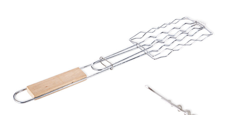 Metal grill brush with wooden handle on a white background