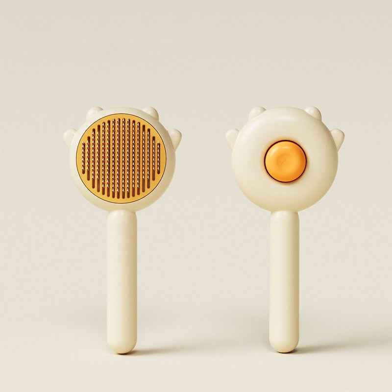 Two handheld grooming tools with circular heads on a light background