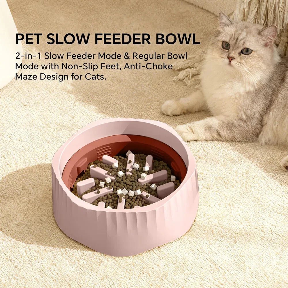 Pet slow feeder bowl with a cat sitting next to it on a carpeted floor.