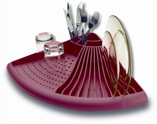 Pink dish drying rack with cutlery and glasses on a white background