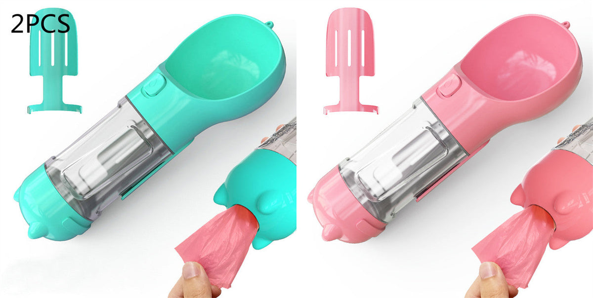 Two ice cream makers, one green and one pink, on a white background.