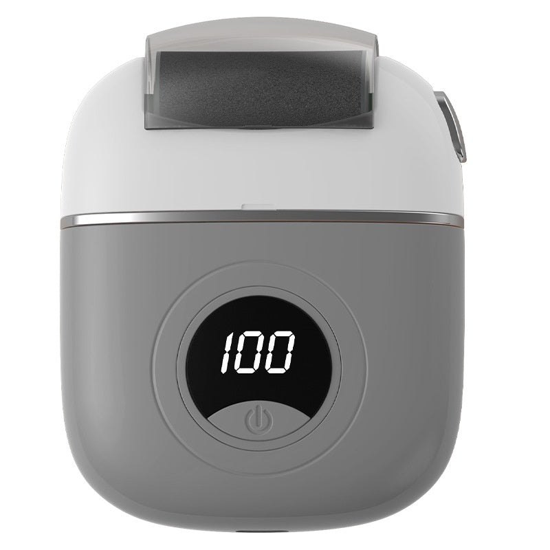 Gray and white electronic device with digital display on a white background