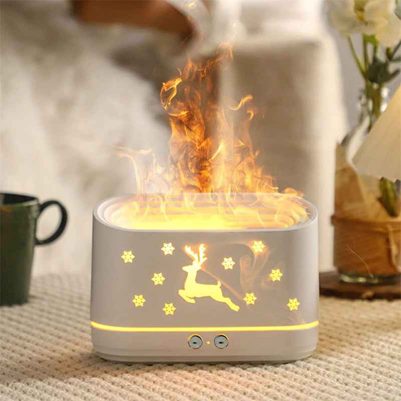 Flameless candle with reindeer design on a textured surface