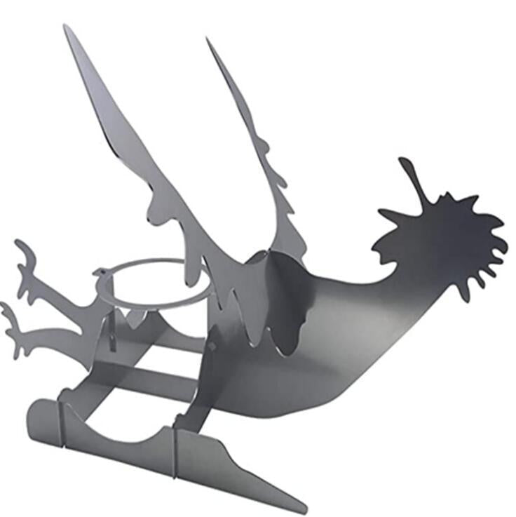 Metal rooster weathervane on a white background