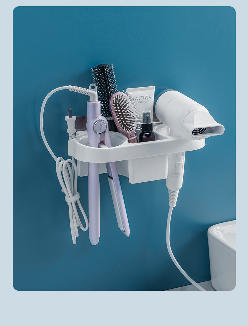 Wall-mounted hair care station with hair dryer, straightener, and other tools on a blue background
