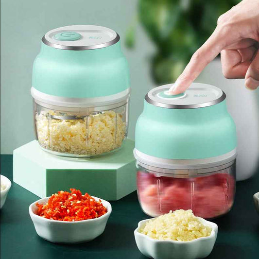 USB rechargeable mini garlic chopper for chopping garlic, ginger, vegetables, and herbs quickly in the kitchen.