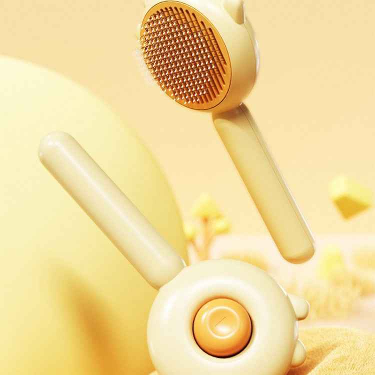 Yellow handheld device with a textured head and smooth handle on a yellow background