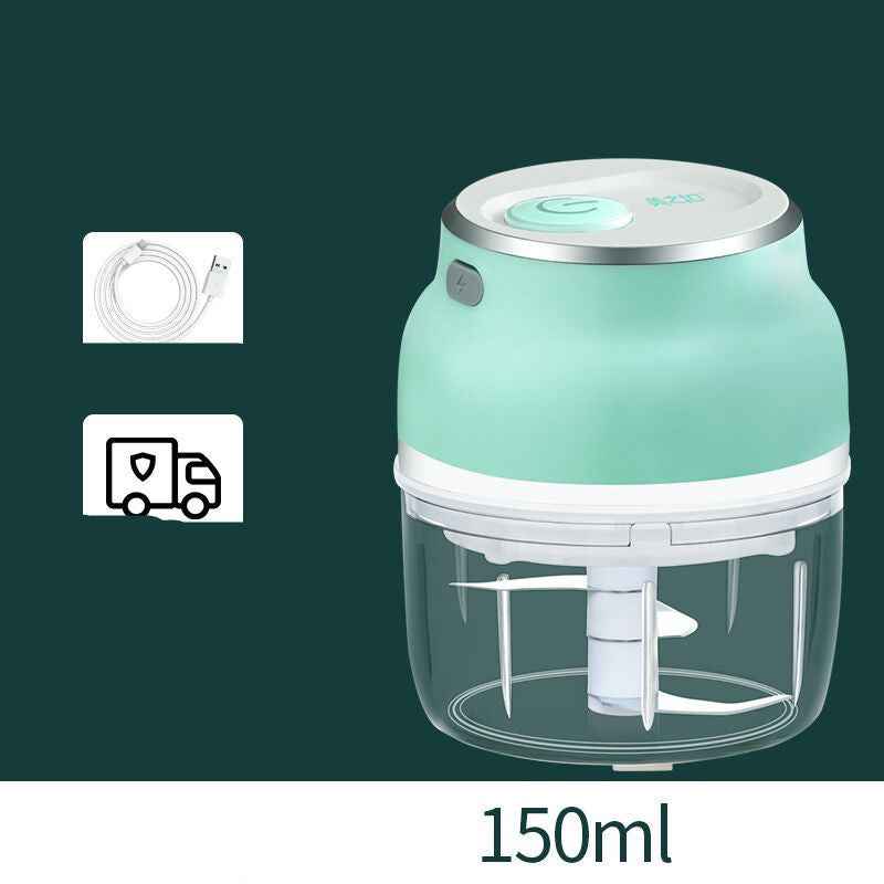 Small green food chopper with clear container on a dark green background