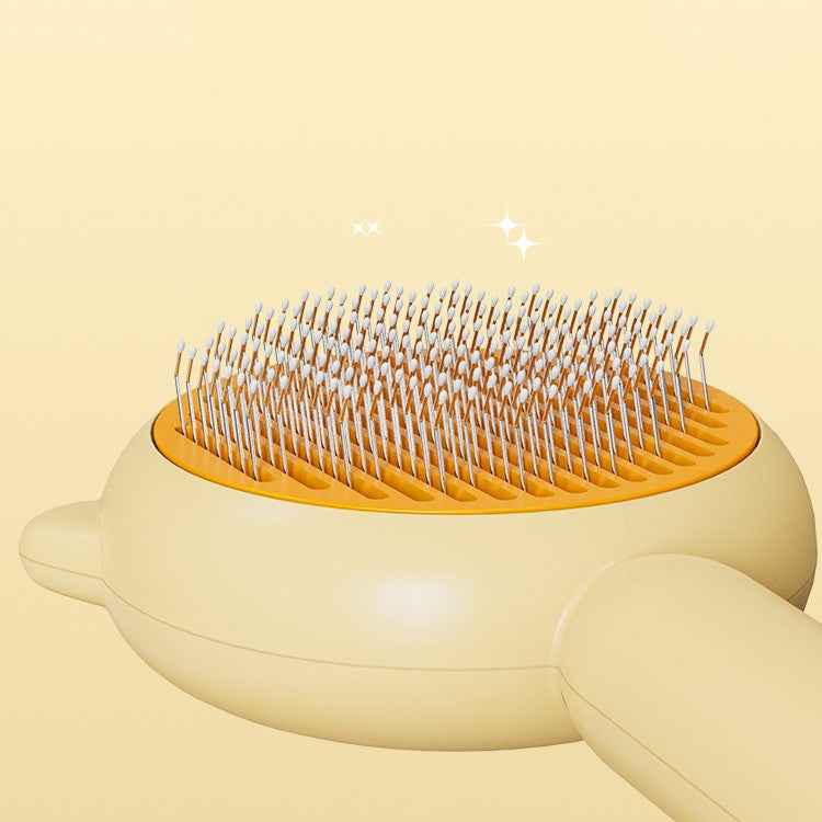 Pet grooming brush with orange base on a beige background