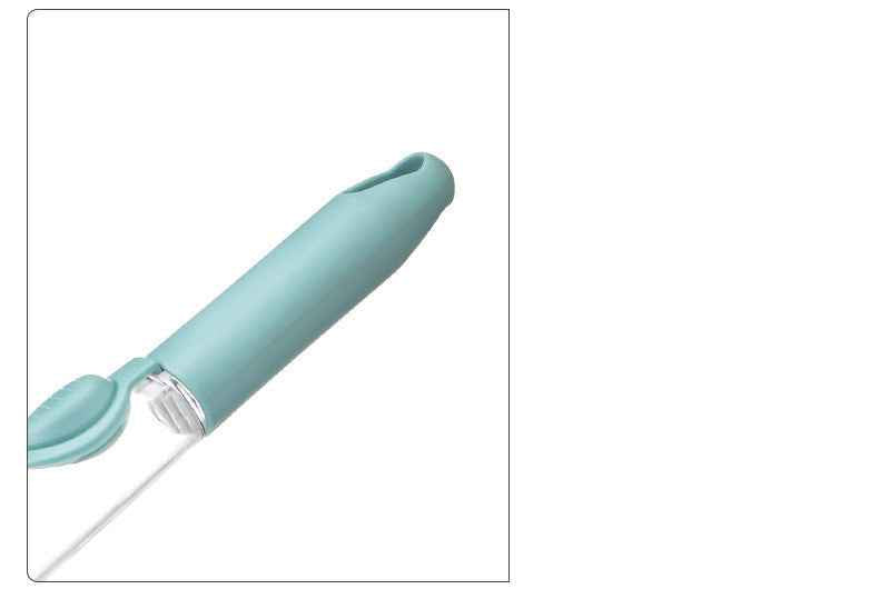Turquoise kitchen tool with a white handle on a white background