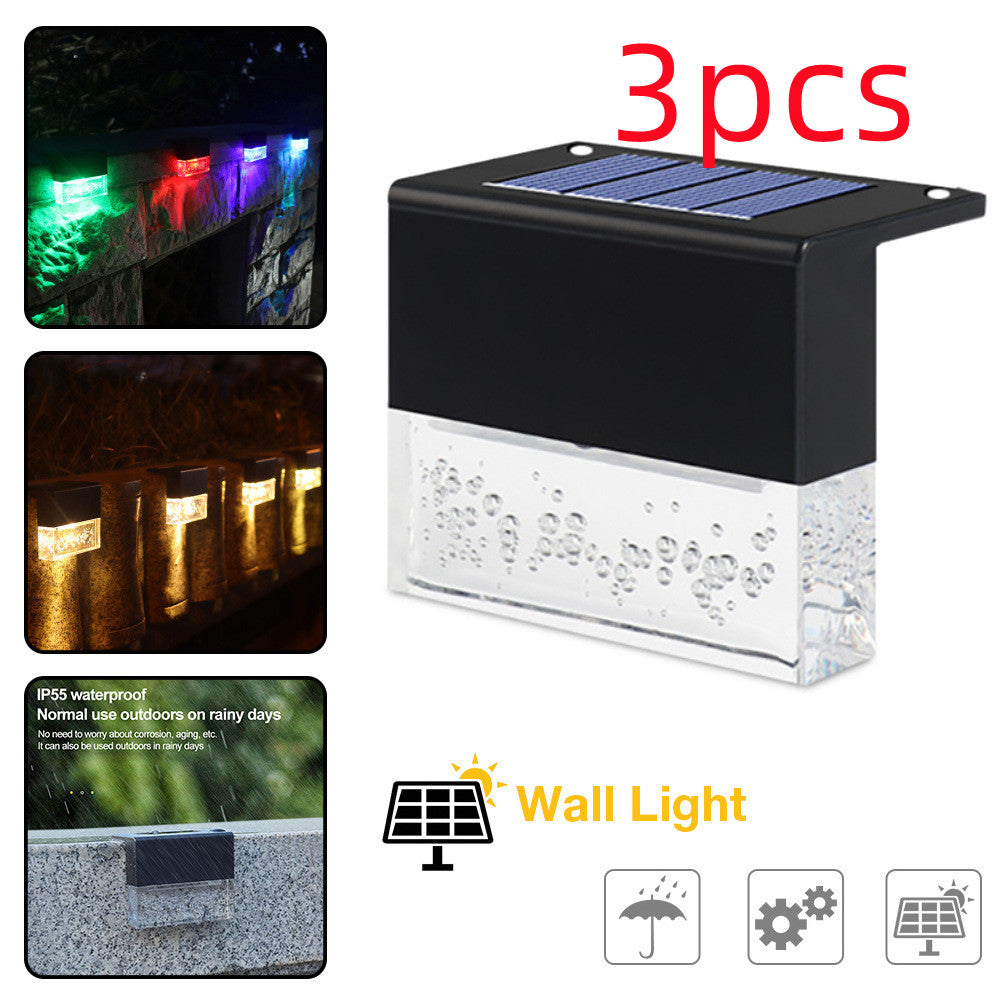 Solar wall light with colorful LED display and waterproof features, shown with '2 pcs' text.