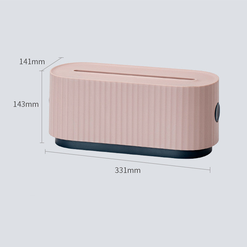 A pink ribbed rectangular device with a dark base, shown with dimension labels 141mm, 143mm, and 331mm on a light gray background.